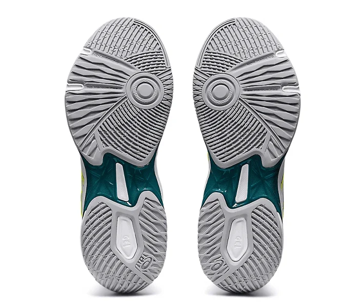 Court shoe outsole showing the pivot point, flex grooves and midfoot shank that let a squash shoe grip and turn