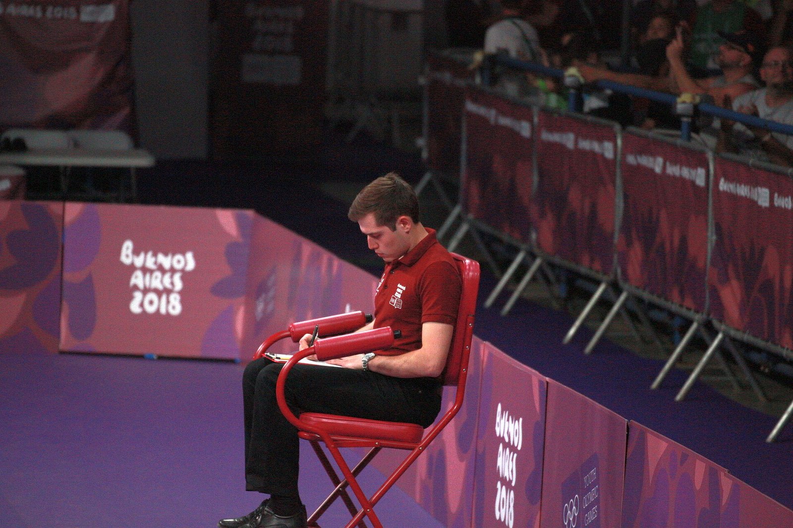 A player competing in the men's singles gold medal match at the Youth Olympic Games
