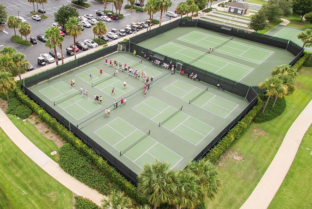 Aerial view of outdoor pickleball courts showing the non-volley zone lines