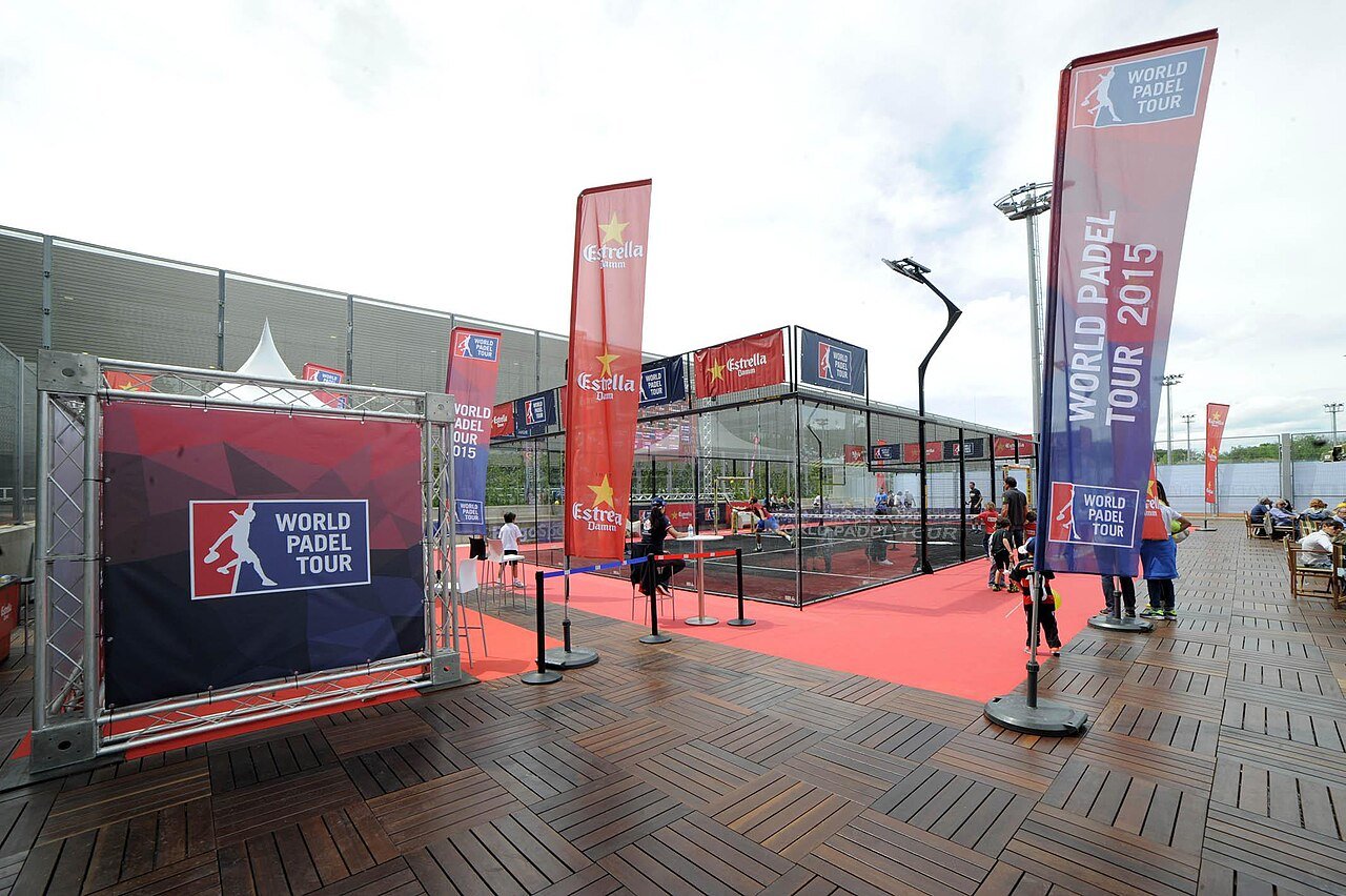 Professional doubles rally on a show court — advanced rackets assume this standard of preparation and contact