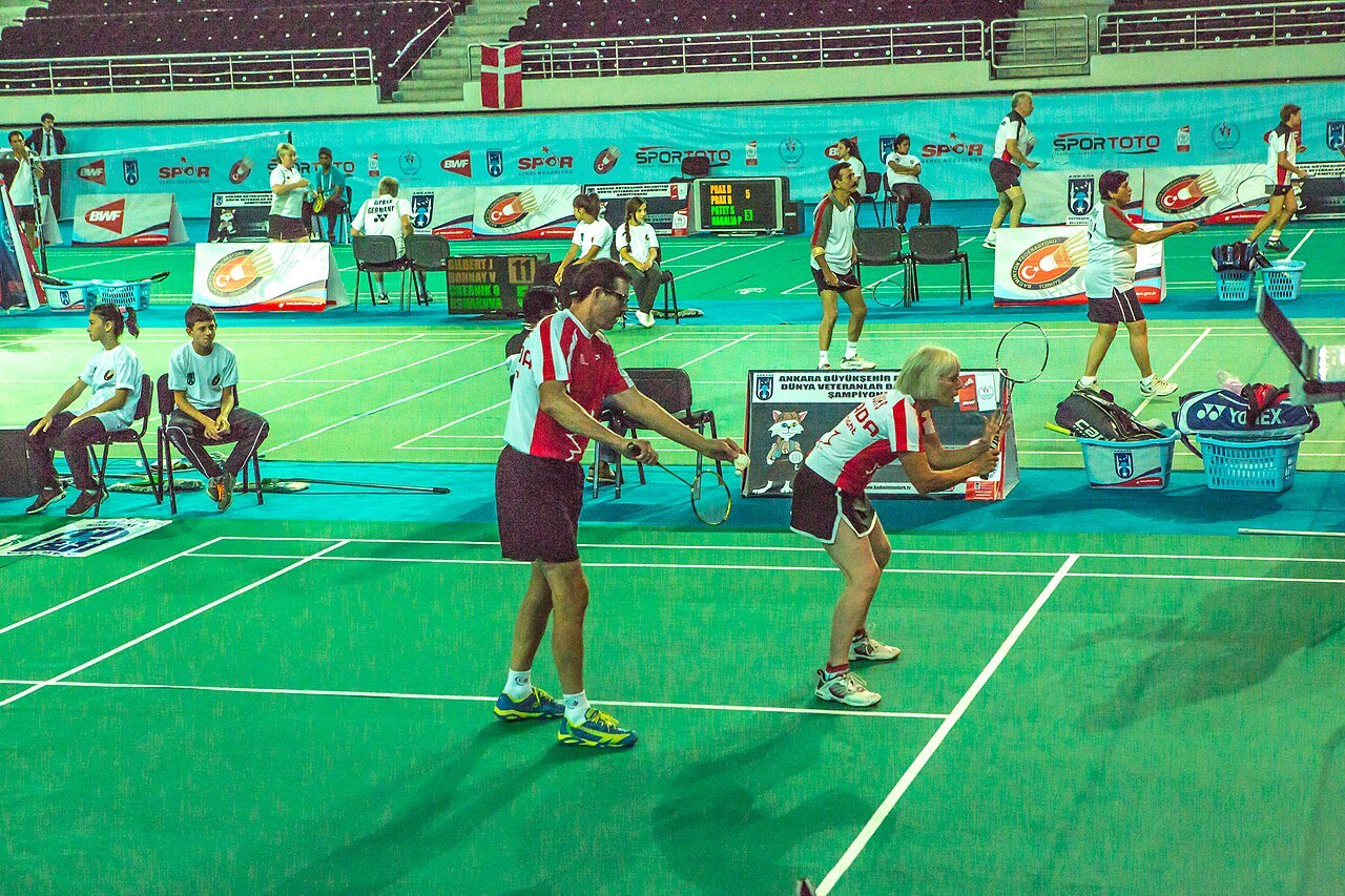Senior players contesting a doubles rally at the BWF World Senior Championships