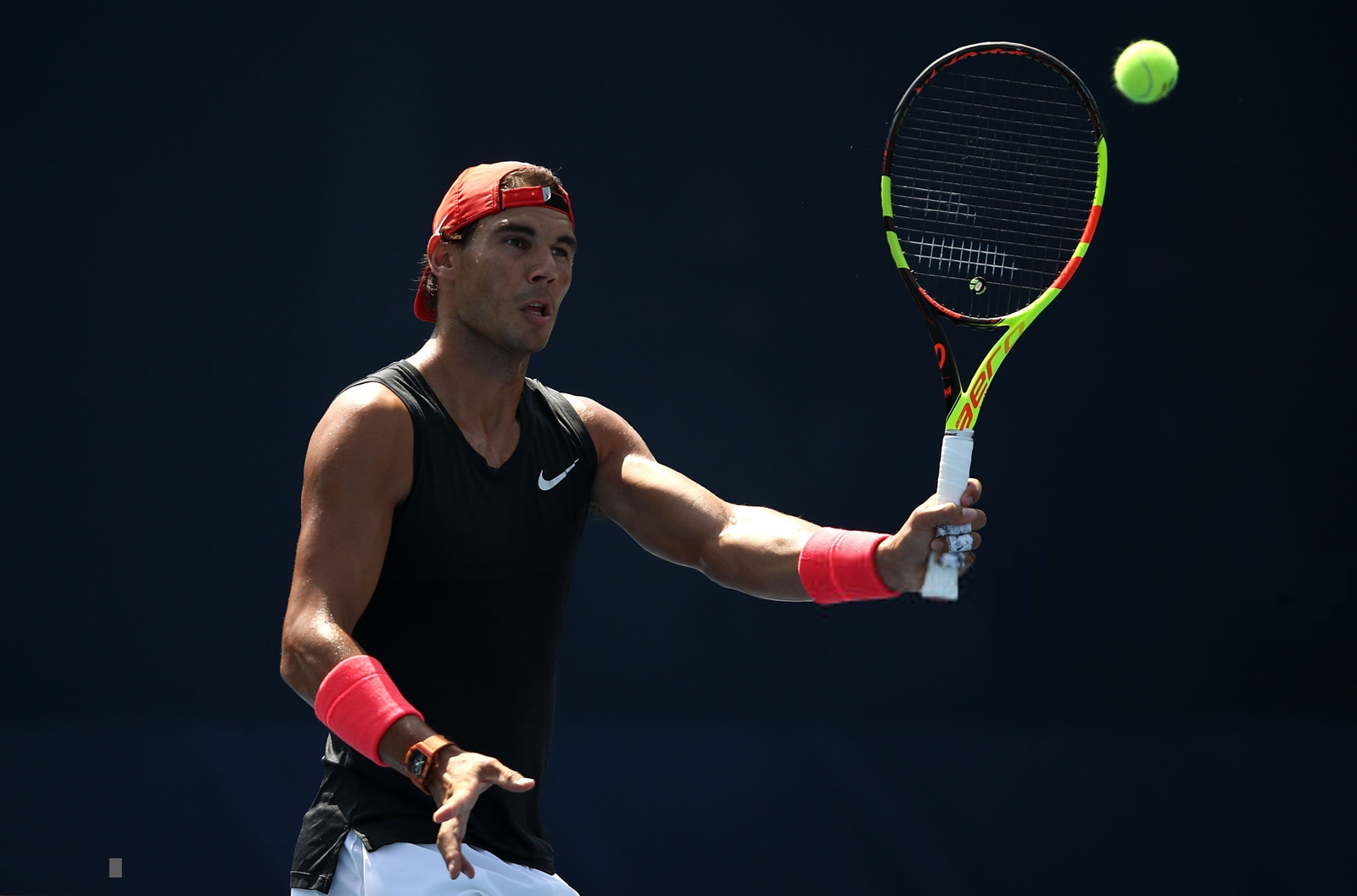 Rafael Nadal hitting a heavy topspin forehand during practice at the US Open