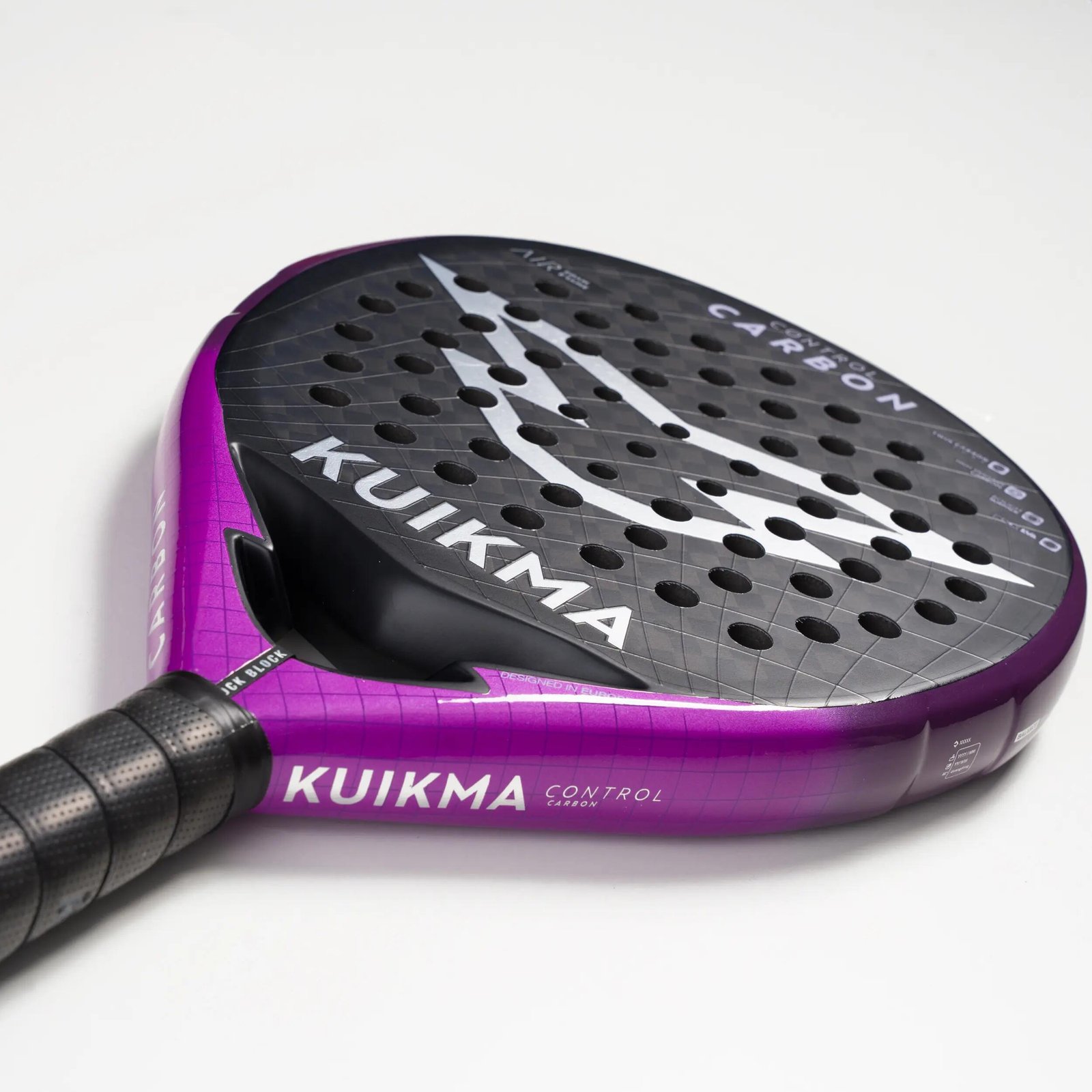 A line-up of padel rackets side by side — models across the brands span the full 350g to 385g adult weight range