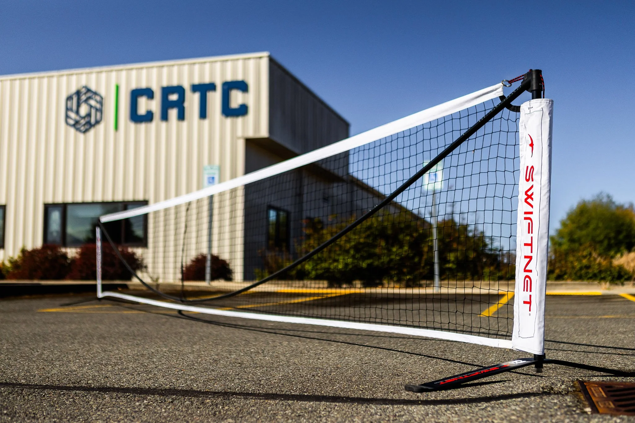SwiftNet 2.1 portable pickleball net set up outdoors